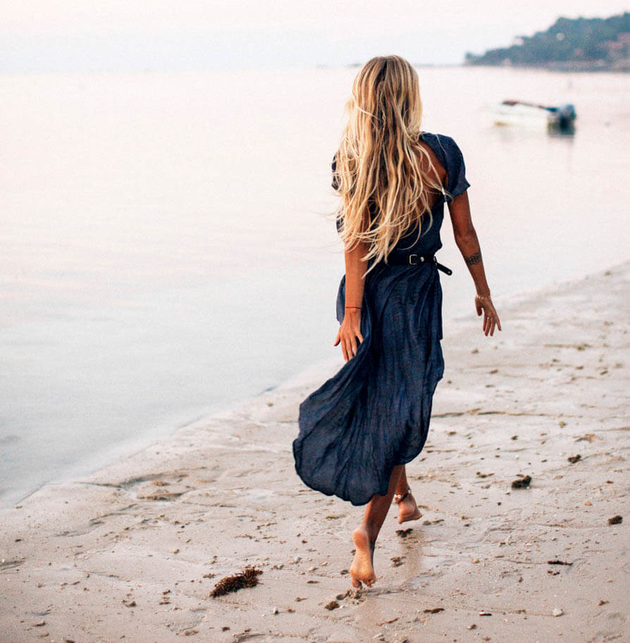 woman walking on beach