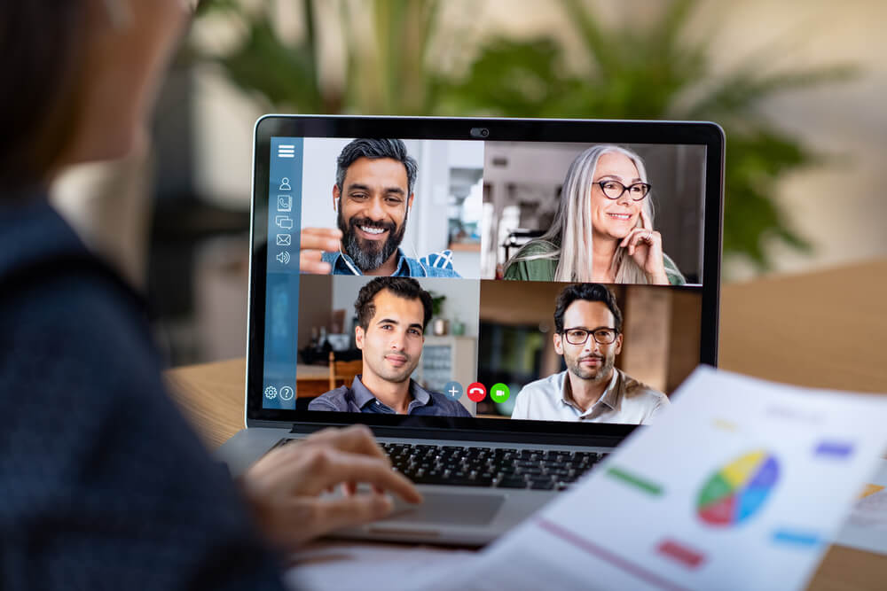 Person having an online meeting with coworkers